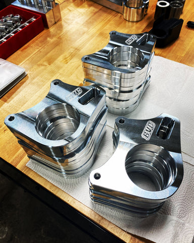 Billet TRX450R rear caliper bracket